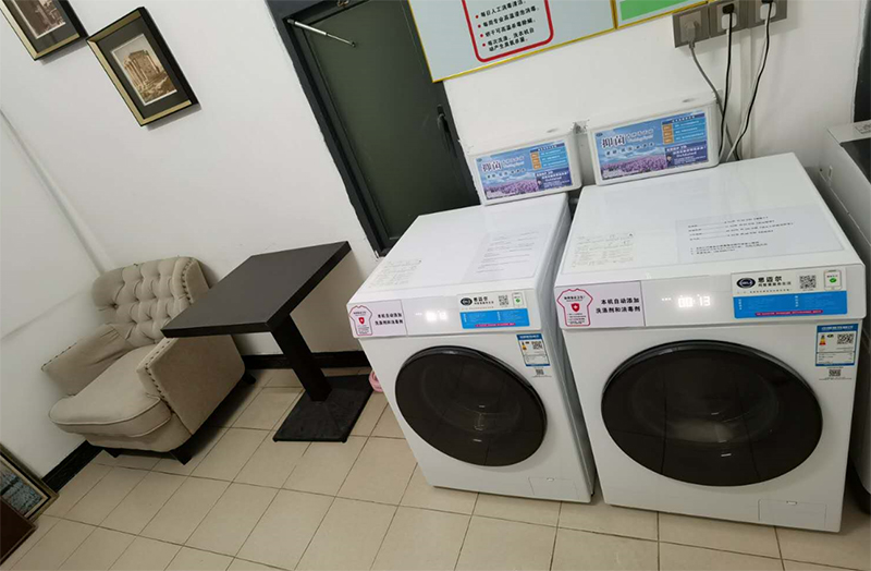 思迈尔与福永汉永酒店自助洗衣机合作项目里增加了洗衣液自动添加设